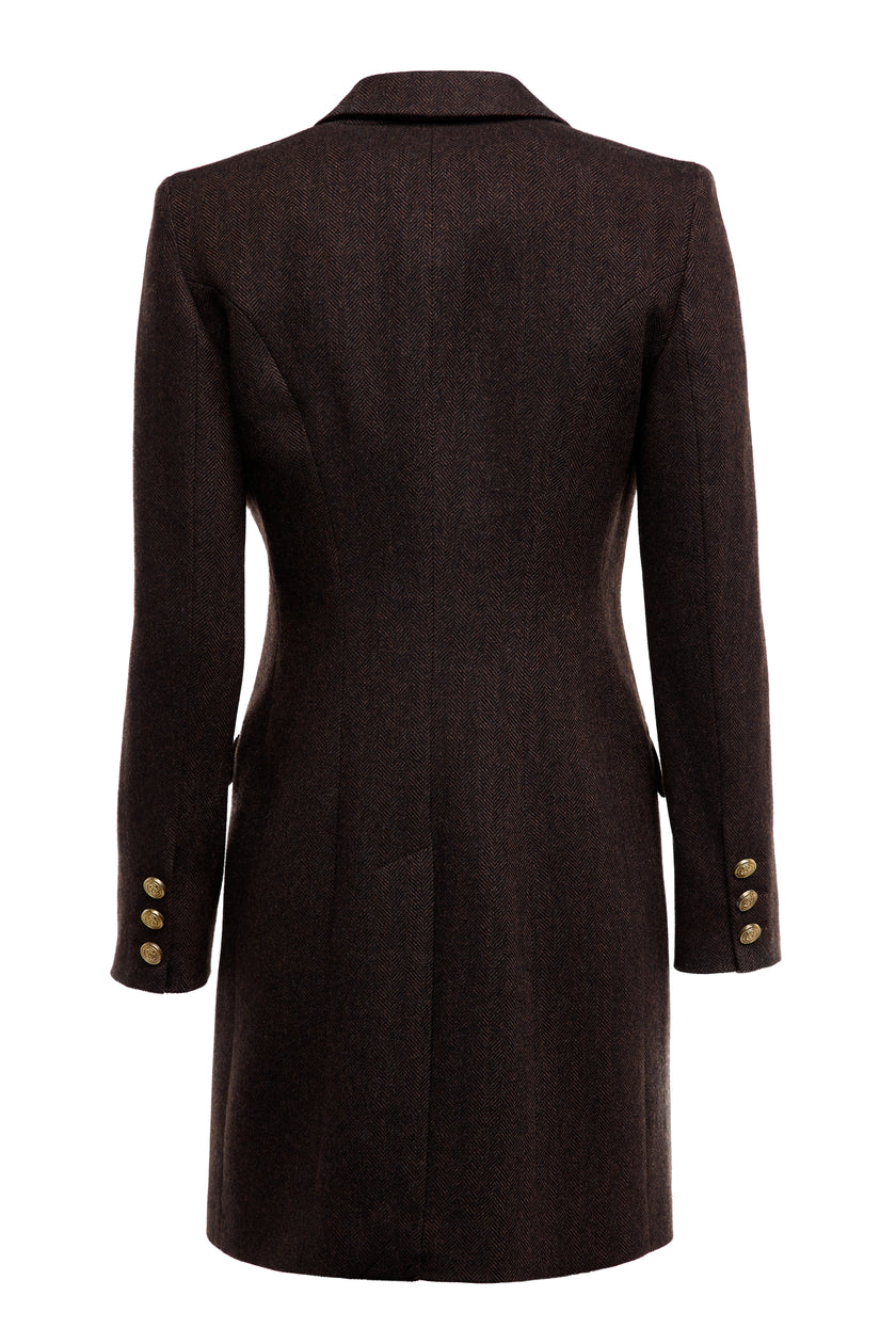 back of womens dark brown herringbone tweed mid-length single breasted coat detailed with gold hardware