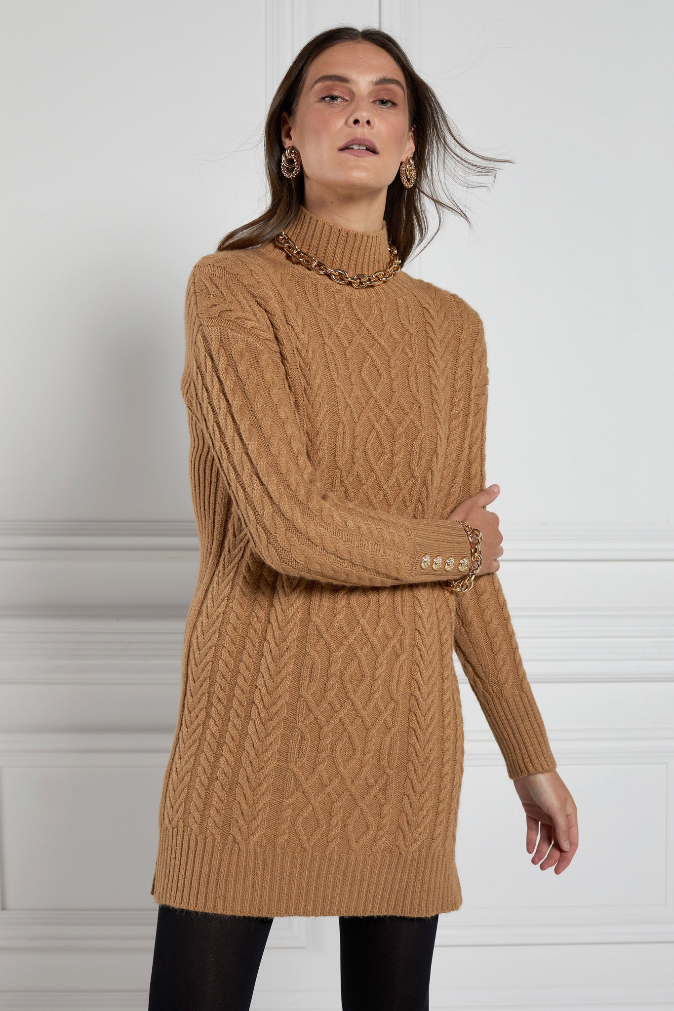 womens dark camel roll neck cable knit mini dress with ribbed cuffs and split ribbed hem with gold button details on cuffs