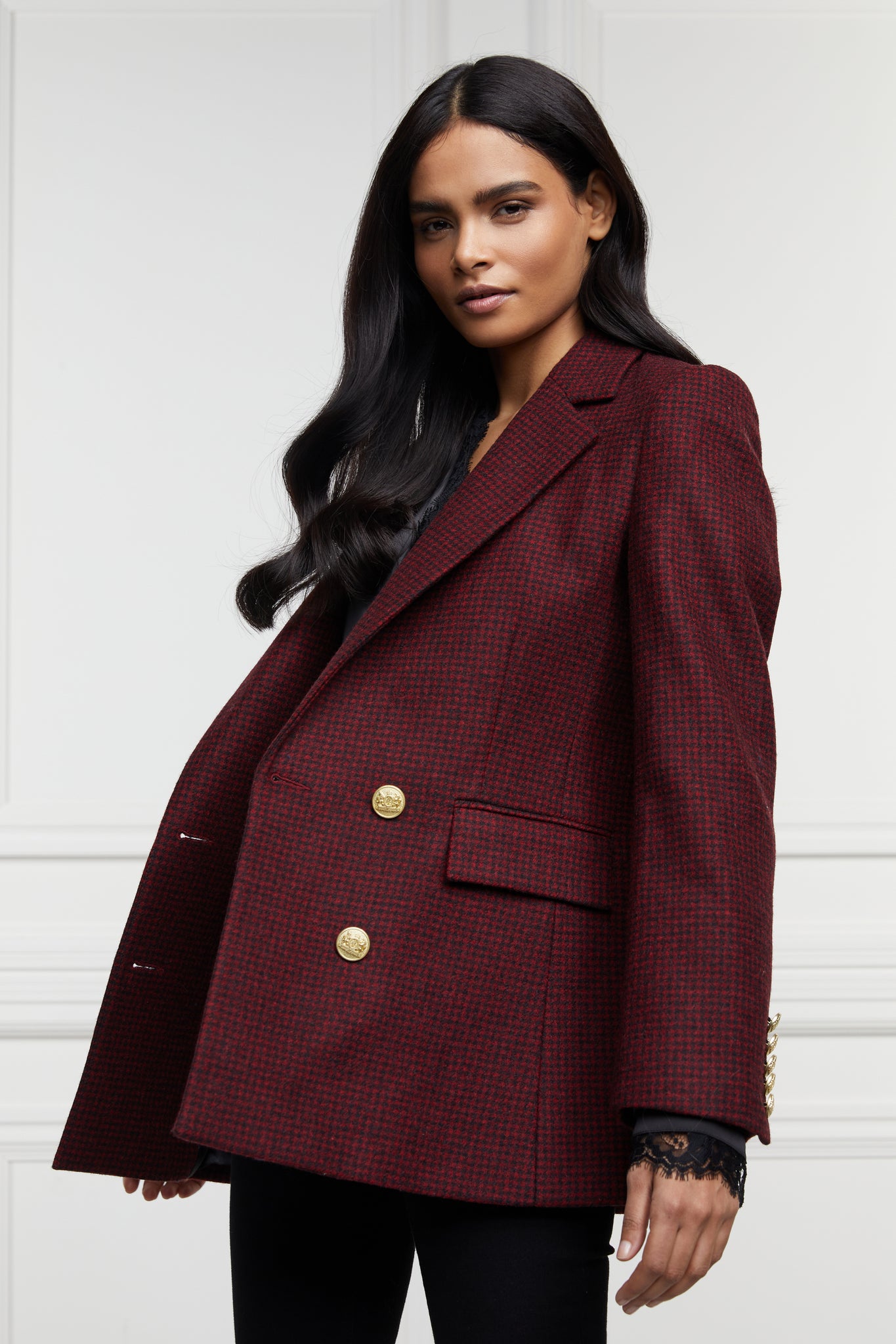 double breasted wool blazer in deep red houndstooth with two hip pockets and gold button detials down front and on cuffs and handmade in the uk