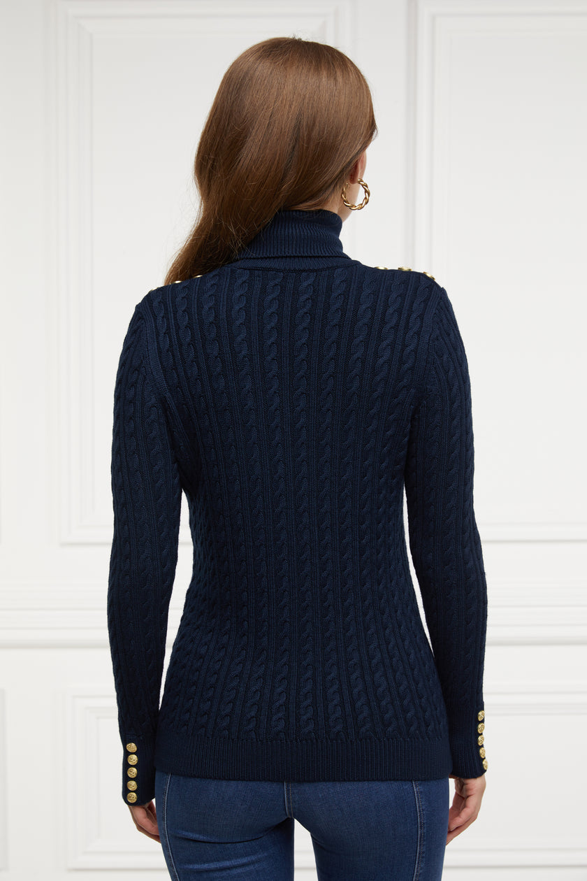 womens cable knit jumper in navy with ribbed roll neck cuffs and hem