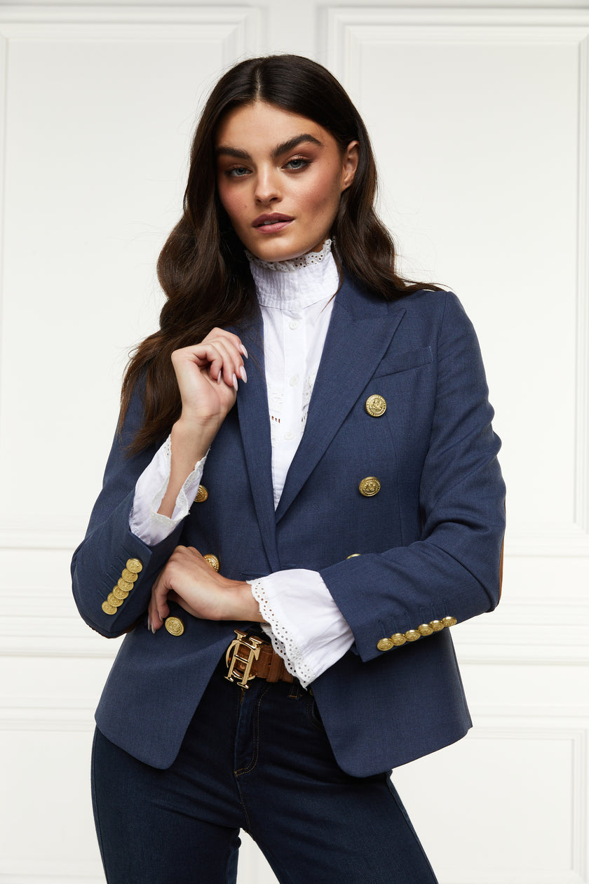 British made double breasted blazer that fastens with a single button hole to create a more form fitting silhouette with two pockets and gold button detailing this blazer in denim