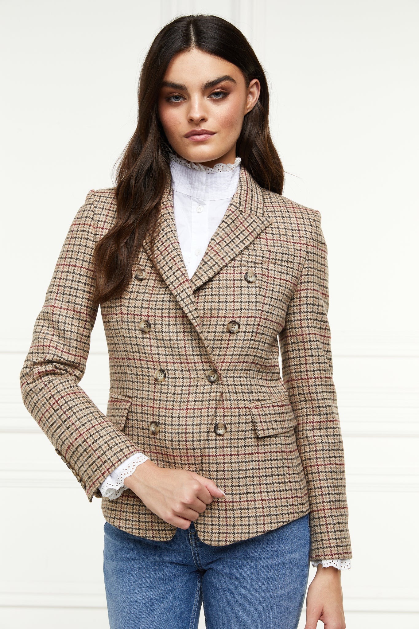 British made double breasted blazer that fastens with a single button hole to create a more form fitting silhouette with two pockets and horn button detailing this blazer is made from camel coloured charlton tweed