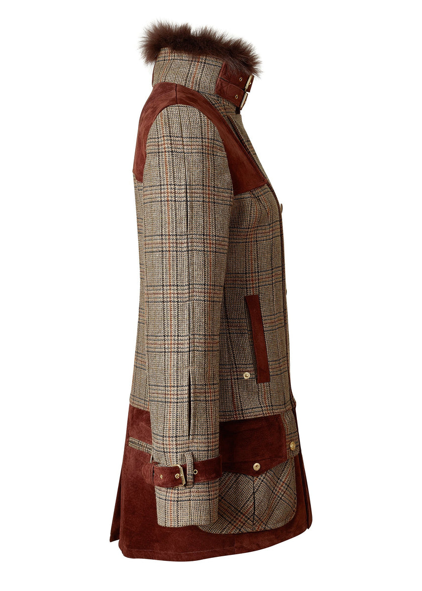 side of womens fitted field jacket in taupe brown orange and blue tweed trimmed with contrast chocolate suede on shoulder across back and on the hip with faux fur trim around the neck finished with horn button fastenings an buckles on the collar cuffs and hip