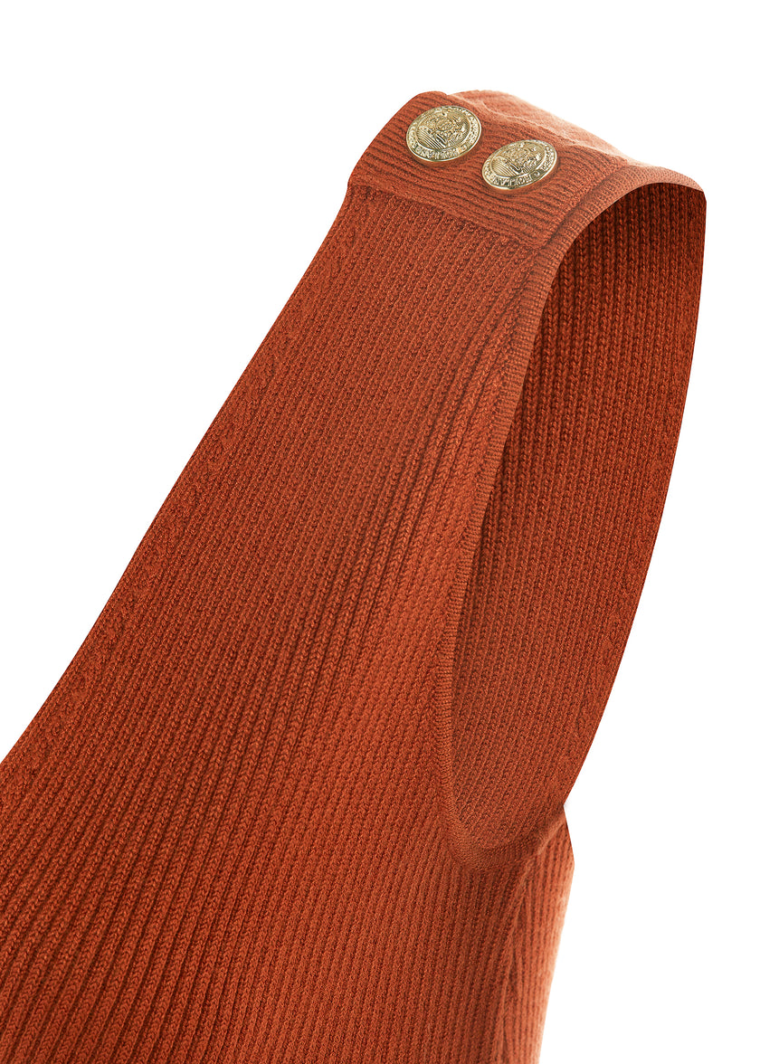 Detailed shot of gold buttons on shoulder of womens ribbed orange v neck midi dress